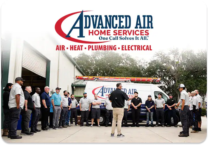 A group of Advanced Air Home Services employees stand in a semicircle outside, listening to a man speak in front of a company van with the business logo above.